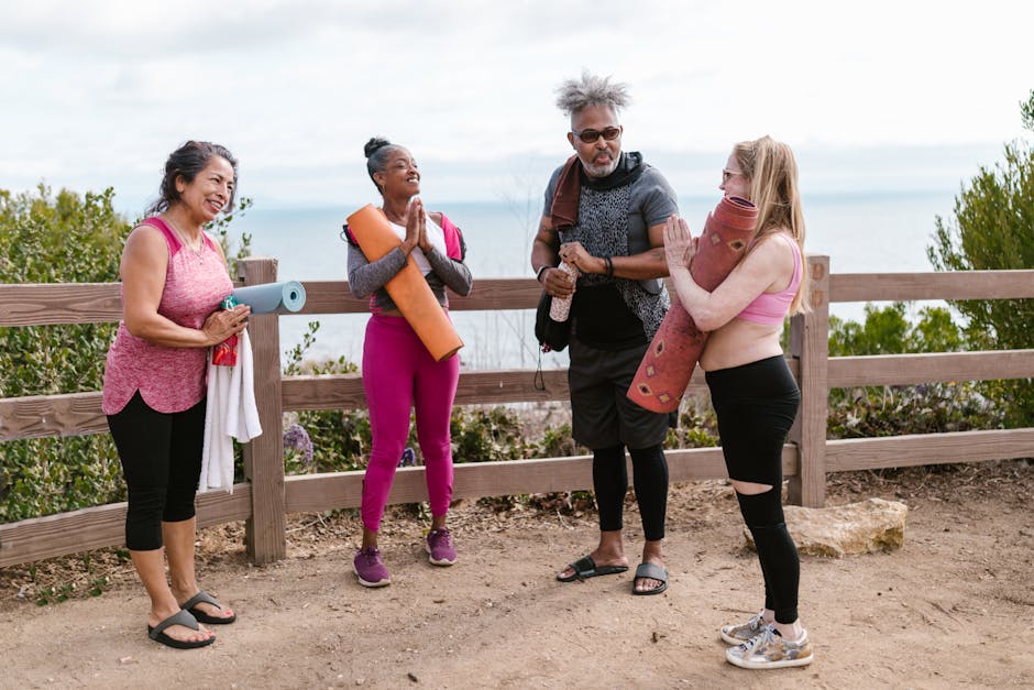 Diverse group of men and women of different ages in comfortable yoga clothes.